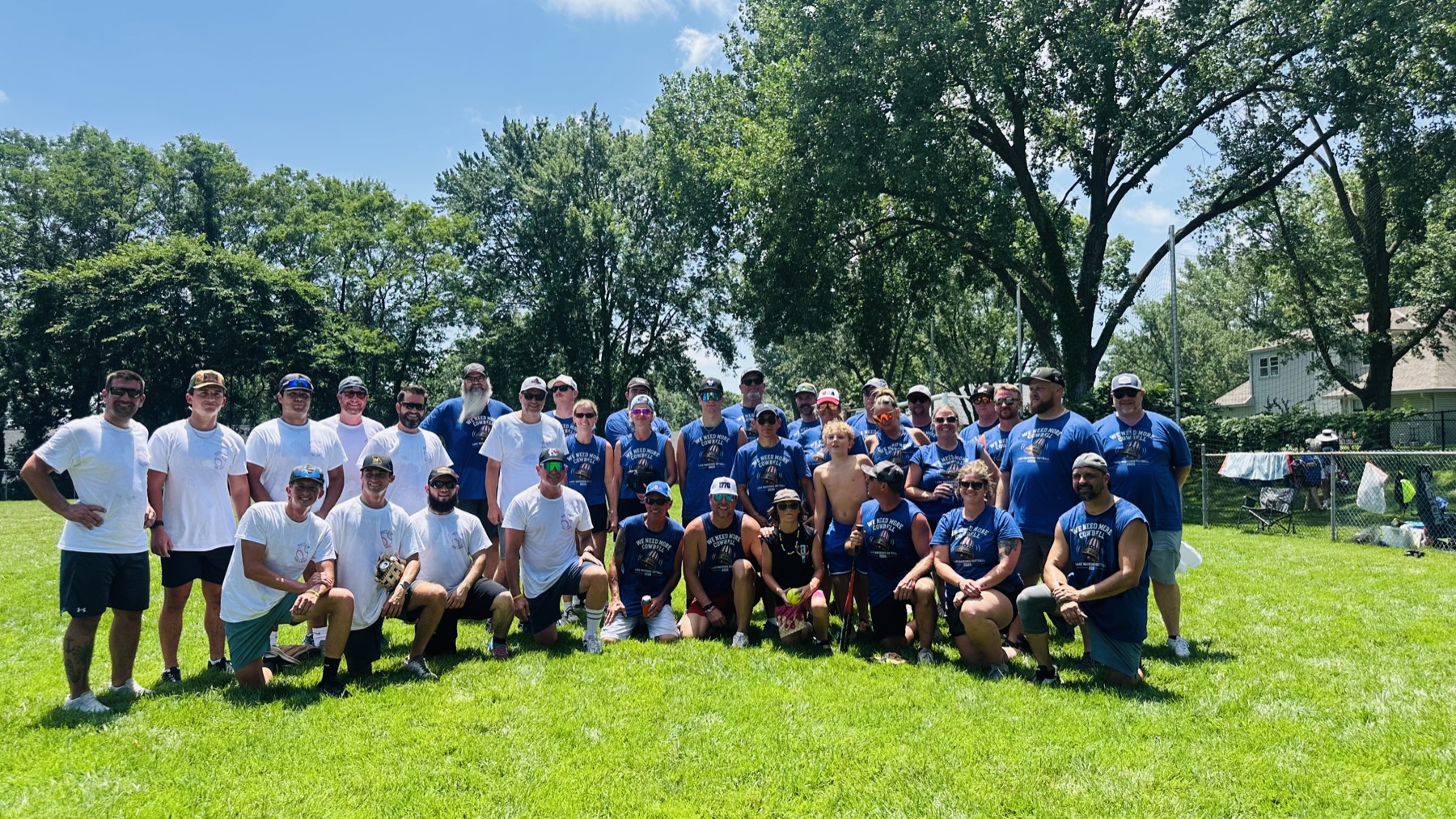 Lake Waukomis and Weatherby Lake softball players after the co-ed rivalry game