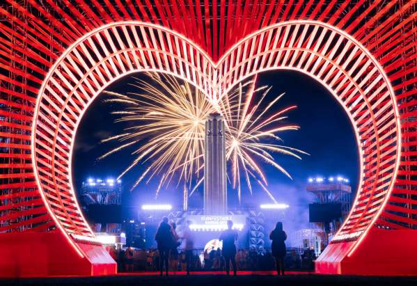 Kansas City FIFA Fan Festival stage with heart-shaped lights and fireworks