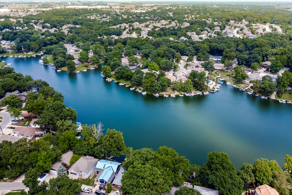 Aerial view of Lake Waukomis shoreline and homes